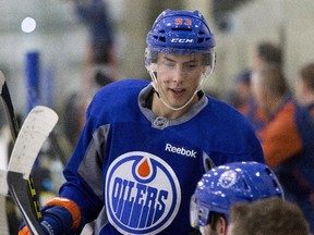 Ryan Nugent-Hopkins's ear was accidentally sliced by John Carlson's skate during the Edmonton Oilers' 7-4 NHL loss to the Washington Capitals on Friday, Oct. 23, 2015.
