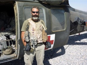 Canadian photographer Louie Palu is seen in southern Afghanistan in October 2010. Palu has turned his experience covering the war into a documentary called "Kandahar Journals."