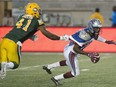 Edmonton Eskimos' Odell Willis tugs on the jersey of Montreal Alouettes' Rakeem Cato during a CFL game in Montreal on August 13, 2015. The Esks and Als renew their rivalry on  Sunday.