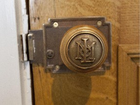 A condominium plan will help determine who is responsible for replacing door hardware.