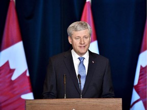 Conservative Leader Stephen Harper speaks during a news conference regarding the Trans-Pacific Partnership deal in Ottawa on Oct. 5, 2015.