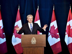 Conservative Leader Stephen Harper speaks during a news conference regarding the Trans-Pacific Partnership deal in Ottawa on Oct. 5, 2015.