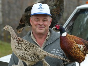 Rick Wood-Samman with stuffed and mounted examples of his birds, a wild turkey and ringnecked pheasants from his Dirt Willy Game Bird Farm and Hatchery near Ardrossan.