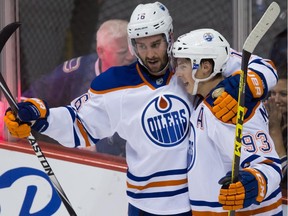Teddy Purcell, left, celebrates a pre-season goal with Edmonton Oilers teammate Ryan Nugent-Hopkins. Purcell is looking to increase his offensive stats.