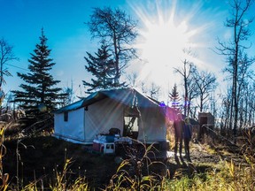 Erika Sherk and Christopher Dart live off the grid in a 320-square- foot canvas tent west of Grande Prairie.