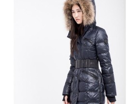 This Rudsak parka incorporates three big trends: Fur or faux-fur trim, belt and a shiny finish.