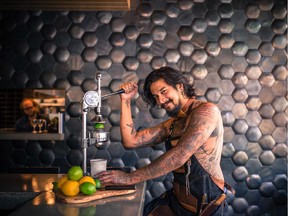 Josh Dissanayake, a chef at North 53, is one of 12 men baring their bits for a pin-up calendar to raise funds for Edmonton's Food Bank.