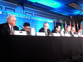 Delegates attending the Trans-Pacific Partnership (TPP) talks hold a press conference in Atlanta, Georgia on Oct. 5, 2015.
