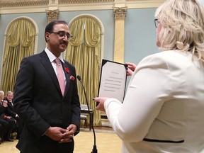 Canada's new Infrastructure and Communities Minister Amarjeet Sohi is sworn in during a ceremony at Rideau Hall in Ottawa on Nov. 4, 2015.