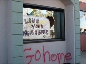 A mosque in Cold Lake, Alberta, shown in this handout image, was being cleaned up after a brick was thrown through its windows and a "go home" message was painted on the wall in October 2014. The mosque has been vandalized for a second time.