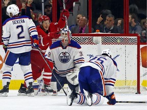 Carolina Hurricanes' Jeff Skinner (53) celebrates his goal after battling Edmonton Oilers' Andrej Sekera (2), Darnell Nurse (25) and goalie Anders Nilsson (39) during the second period of an NHL game, Wednesday, Nov. 25, 2015, in Raleigh, N.C. The Hurricanes won 4-1.