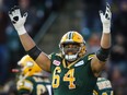 Edmonton Eskimos offensive lineman Andrew Jones celebrates a touchdown during the CFL's West Division final against the Calgary Stampeders at Commonwealth Stadium on Nov. 22, 2015.