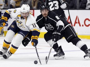 Nashville Predators centre Cody Hodgson (11) battles Los Angeles Kings defenceman Drew Doughty (8) during NHL action on Oct. 31, 2015.