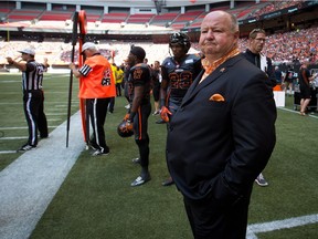 B.C. Lions' president and CEO Denis Skulsky watches from the sideline as the team plays the Saskatchewan Roughriders in Vancouver, B.C., on Aug. 24, 2014.