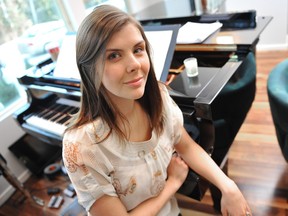 Kristen Fersovitch, who died in October 2013, is seen here rehearsing for her solo in the Singing Christmas Tree in 2011. Pastor Bob Jones of North Pointe church has written a book that he's hoping will raise money to put toward a trust fund for Fersovitch's three young sons.