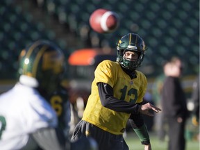 Edmonton Eskimos quarterback Mike Reilly throws a pass on a chilly day during the CFL team's practice at Commonwealth Stadium on Nov. 18, 2015.
