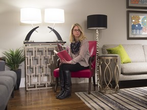 Chantal Dueck of  McElheran's Fine Furniture in an arm chair in soft, warm pink