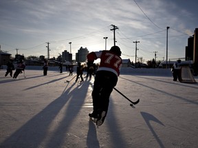 The sun sets on an outdoor community rink in Edmonton in 2012.