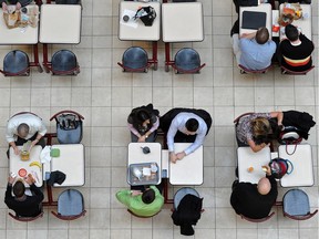 People enjoy their lunch break in the Food Court in City Centre Mall in Edmonton on Sunday Jan.20, 2013.