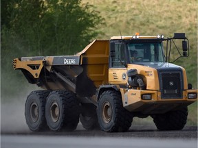 A large truck drives through the Highvale coal mine near the Keephills Power Plant on May 25, 2015.