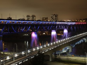 The High Level Bridge over the North Saskatchewan River in Edmonton was lit up in blue, white and red, the colours of the flag of France, to honour the victims of the terrorist attacks in Paris, France. Nov. 15, 2015.