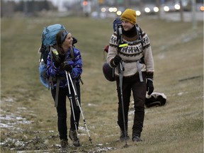 Sarah Jackson, left, has made it a personal challenge to walk across Canada on the Trans Canada Trail. She started this summer in Victoria, B.C., and is walking through Edmonton this weekend, en route to St. John's, Newfoundland. Her friend, Stephen Wynnyk, right, has joined her on part of the walk from Cochrane, Alberta, to Saskatchewan.