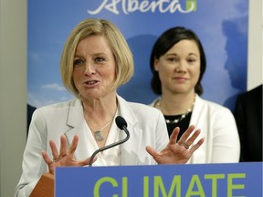 Alberta Premier Rachel Notley, left, and Environment Minister Shannon Phillips will table the Climate Leadership Implementation Act, also known as Bill 20, in the legislature on Tuesday, May 24, 2016.