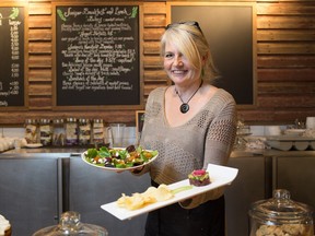 Co-owner Peggy Adams with the beet and goat cheese salad and the tuna tartare at the Juniper Café and Bistro