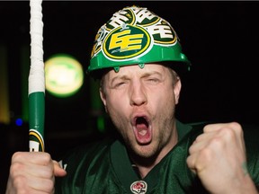 Corey Loranger cheers during the Edmonton Eskimos' Grey Cup party at the Northlands Expo centre in Edmonton November 29, 2015.