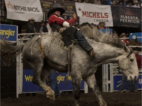 Jake Vold, pictured on a winning ride on Day 3 of the 2014 CFR bareback riding competition, goes into the 2015 edition of the rodeo the season leader.