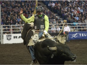 Dakota Buttar at the Canadian Finals Rodeo on Nov. 9, 2014, held at Rexall Place in Edmonton. Buttar won the bull riding event.