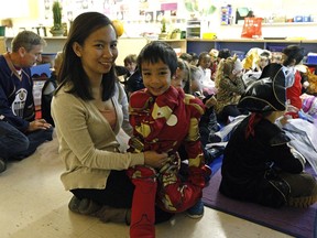 Mirasol Cabalagnan and her son five-year-old son  Isaiah in the kindergarten class at St. Benedict Catholic School in Edmonton.