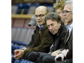 EDMONTON, ALBERTA OCTOBER 5, 2015: GM Peter Chiarelli, owner Daryl Katz and Craig MacTavish look on during Oilers practise at Rexall place in Edmonton on Monday Oct. 5, 2015.  (photo by John Lucas/Edmonton Journal)(for a story by Jim Matheson)