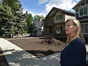 Lynn Odynski is part of the Old Glenora Conservation Association, which is looking at ways to preserve old trees from being chopped down when infill housing is being built in mature Edmonton areas like Old Glenora. This photo was taken Aug. 18, 2015.