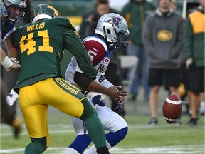 Edmonton defensive end Odell Willis forces a fumble on Montreal Alouettes quarterback Kevin Glenn during the Eskimos' 40-22 CFL win at Commonwealth Stadium on Nov. 1, 2015.