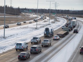 The Anthony Henday is a parking lot near Lessard road after a bit of snow in Edmonton, Nov. 19, 2015.