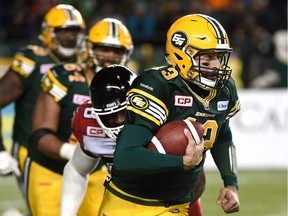 Edmonton Eskimos quarterback Mike Reilly runs out of the pocket against the Calgary Stampeders during the West Division final at Commonwealth Stadium in Edmonton on Sunday.
