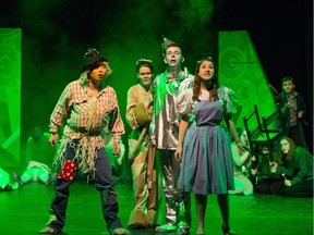 Jeong Ung Song as Scarecrow, Chelsea Rowe as the Cowardly Lion, Brayden Saunders as Tin Man and Ayla Gondall as Dorothy  perform in the Cappies production of Wizard of Oz at Harry Ainlay High School. The show had alternatiing casts on various evenings.