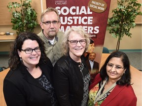 Social-work professors Julie Drolet, left, with colleagues Rick Enna, Linda Kreitzer and Janki Shanka, all experts on immigration and refugees working to raise money with the Edmonton Mennonite Centre for Newcomers to cover housing, food, clothing and transportation for a Syrian family of five for one year in Edmonton.
