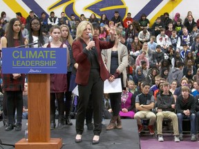 Alberta premier Rachel Notley explains the government's climate change plan to students at Queen Elizabeth High School in Edmonton on November 25, 2015.