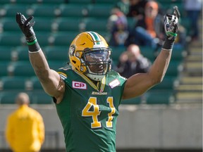 Edmonton Eskimos defensive end Odell Willis celebrates a tackle against the B.C. Lions in a CFL game at Commonwealth Stadium on Sept. 26, 2015.