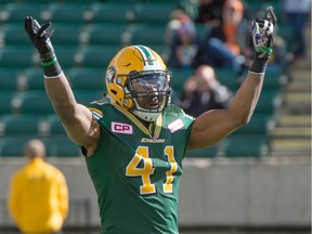 Odell Willis celebrates a tackle as The Eskimos play the BC Lions in Edmonton on Sept. 26, 2015.
