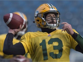 Edmonton quarterback Mike Reilly prepares to throw the ball during a team practice Friday in Winnipeg as the Eskimos get ready for Sunday's Grey Cup.