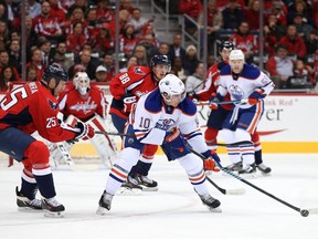 Oilers' Nail Yakupov (10) skates past Jason Chimera (25) of the Washington Capitals during the first period at Verizon Center on Nov. 23, 2015 in Washington, D.C.