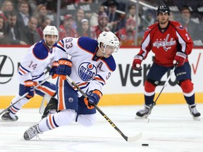 Ryan Nugent-Hopkins (93) of the Edmonton Oilers controls the puck against the Washington Capitals during the second period at Verizon Center on Nov. 23, 2015 in Washington, D.C.
