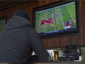 Even in their hometown, the Edmonton Eskimos aren't always the popular choice on TV screens among bar patrons, many who cheer for the NFL.