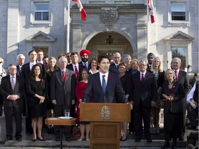 Prime Minister Justin Trudeau holds a news conference with his cabinet after they were sworn-in at Rideau Hall, the official residence of Governor General David Johnston, in Ottawa on Nov. 4, 2015.
