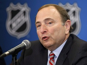 NHL commissioner Gary Bettman speaks at a news conference before the NHL Awards show Wednesday, June 24, 2015, in Las Vegas. The NHL is taking its time on expansion and the Olympics. Bettman reiterated Monday morning there's no timeline for the board of governors to make a decision about expanding to Quebec City, Las Vegas, both or neither.