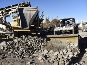 Moving old concrete for crushing.