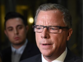 In the legislative building rotunda in Regina on Nov. 16, 2015, Saskatchewan Premier Brad Wall talks about asking the federal government to suspend the current plan to bring 25,000 Syrian refugees into the country.